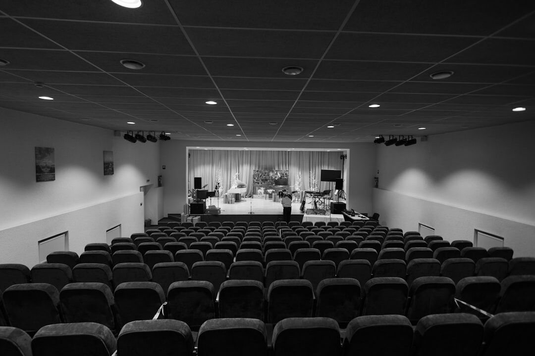 Conference keynote speech in auditorium
